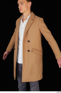 Johnny Reed brown coat business dressed upper body 0002.jpg